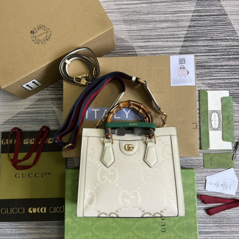 G*u*i top handle bags
